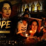 Myanmar Cuts Suu Kyi’s Sentence but Keeps Her Detained, While Former President Walks Free