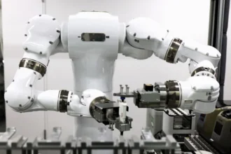 Tokyo University Launches Fully Autonomous Lab Where Robots Run the Show The lights are on at the University of Tokyo’s newest chemistry lab, but the lab coats are gone. In a move that signals a shift for experimental science, the university has officially opened a facility where robots handle the entire research cycle—from mixing chemicals to analyzing results—without a single human in the room. This isn’t just a room with a few automated arms. It’s a closed-loop system designed to hunt for new materials for batteries and semiconductors at speeds that make traditional methods look like they’re standing still. The AI designs the experiment, the robots execute it, and the data feeds right back into the AI to decide what happens next. "The goal is to remove the bottleneck of human physical labor," a researcher involved in the project’s pilot phase said. "A human can do maybe ten experiments a day. This system won't stop at ten, and it doesn't need to go home at 5:00 PM." The stakes are high. Japan is currently locked in a global race to find more efficient materials for the next generation of electric vehicle batteries. By cutting humans out of the "pipette-and-wait" cycle, the university expects to compress years of trial-and-error into a few weeks of non-stop robotic iteration. It’s a response to a looming crisis, too. Japan’s shrinking workforce means there are fewer young scientists entering the field every year. Automating the grunt work isn't just about speed; it’s about survival in a country where human talent is becoming a scarce resource. Critics often worry that "robot-run" means "job-lost," but the university’s lead engineers argue the opposite. They say the move frees up researchers to actually think, rather than spending eight hours a day performing repetitive liquid handling. The robots don't get bored, they don't make clerical errors, and they don't suffer from "Friday afternoon" fatigue that can ruin a data set. The lab is currently focused on thin-film materials, but the team plans to scale the technology to other branches of chemistry soon. If it works, the image of the lone scientist hunched over a workbench might soon be a relic of the past. The lab is running right now. It’ll be running tomorrow morning. And it won't need a coffee break to get through the night.