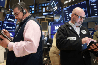 Dow Hits Record High as Geopolitical Optimism Lifts Wall Street; Broadcom Revenue Miss Drags Chip Stocks