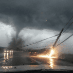 Dashcam Footage Shows Tornado Dropping Power Lines on Moving Car