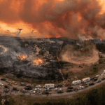 Jasper wildfire doubles in size as thousands flee mountain town