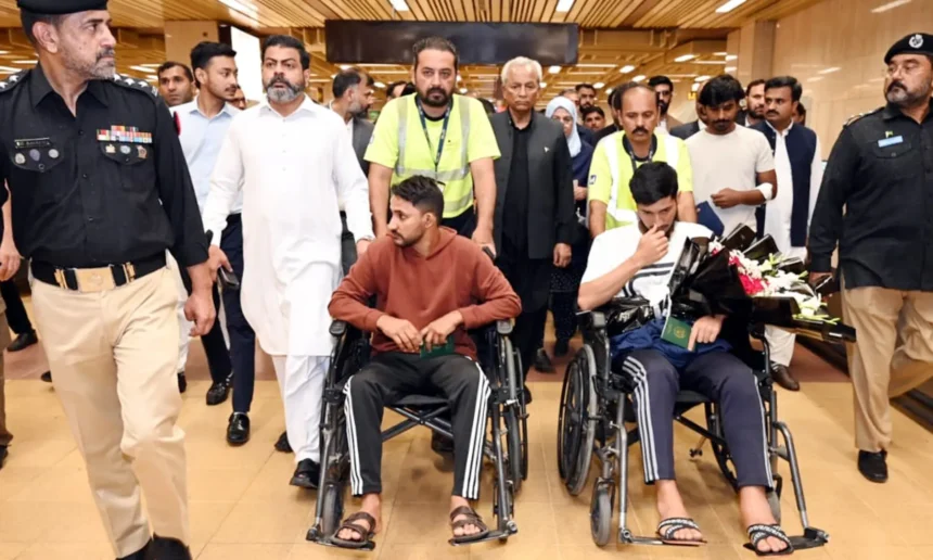 Four rescued Pakistani sailors arrive at Karachi airport