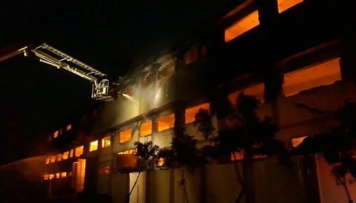 Firefighters battle a factory fire in Karachi.